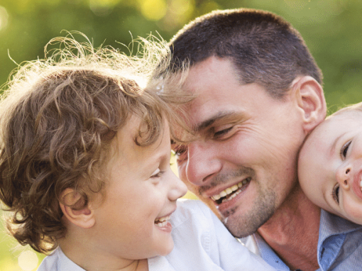 Man playing with 2 children