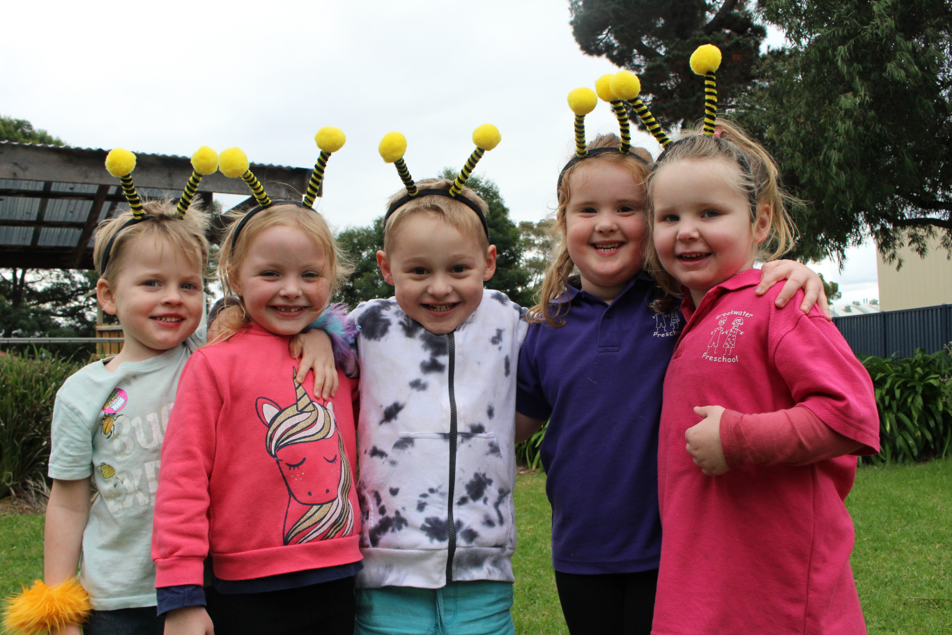 5 kindergarten kids wearing bee Antenor headbands