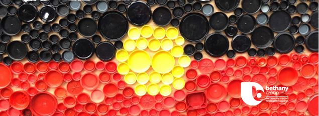 RAP2 Photograph of the Aboriginal Flag, presented as coloured bottle lids