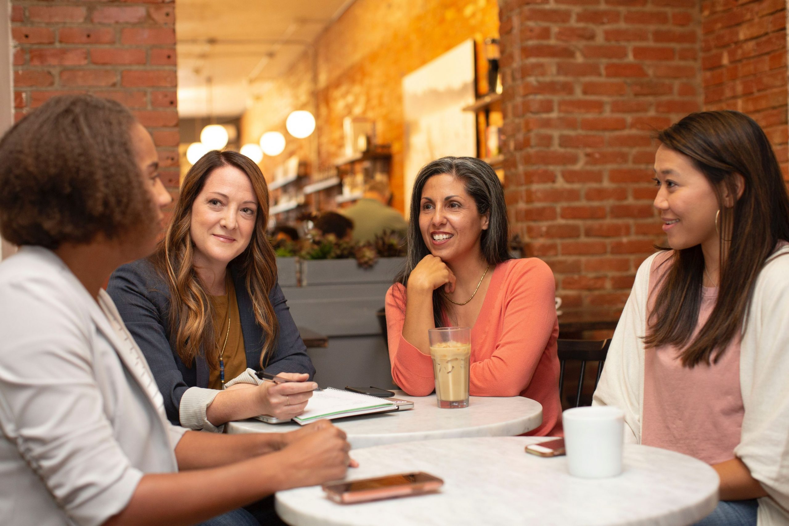 corporate team 4 women having a meeting