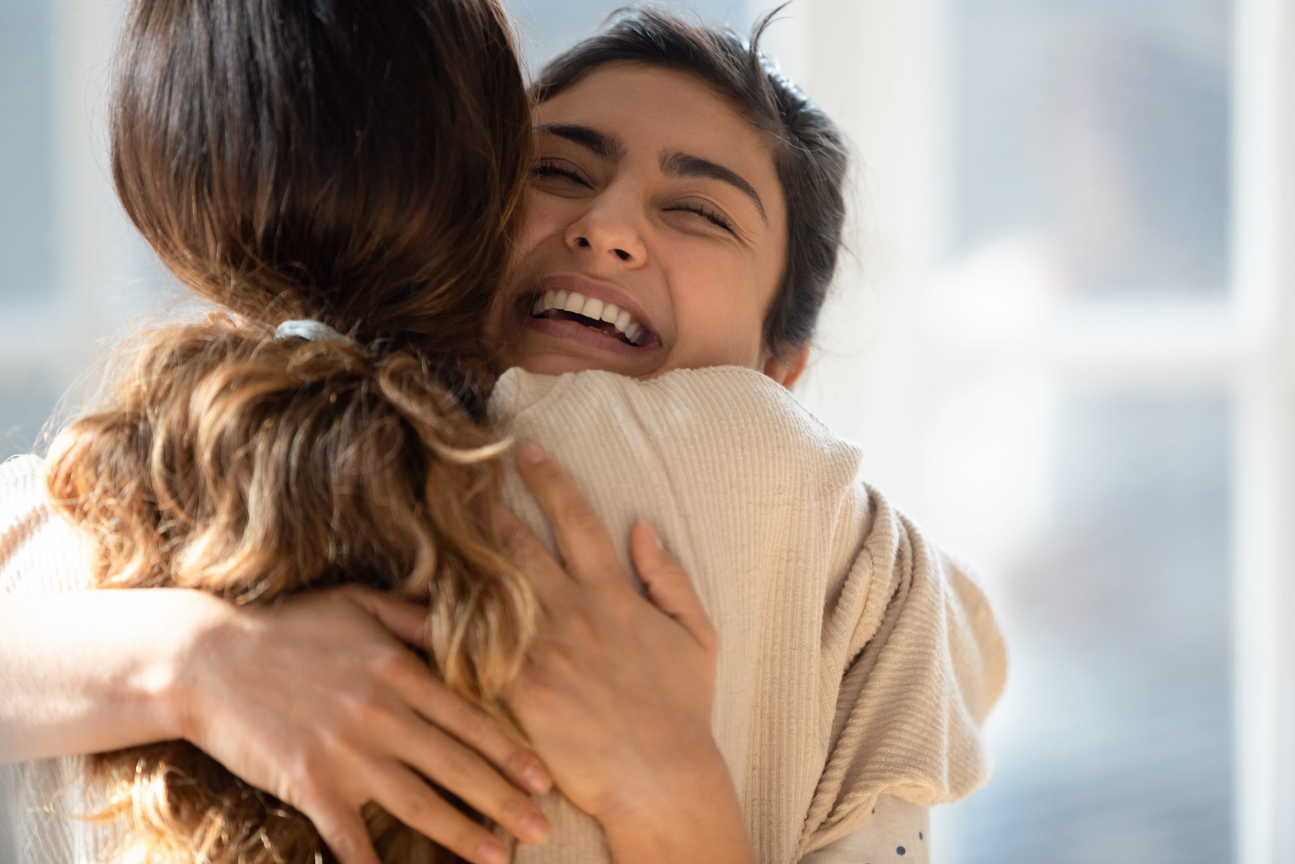 Head,Shot,Close,Up,Happy,Mixed,Race,Girl,Cuddling,Smiling